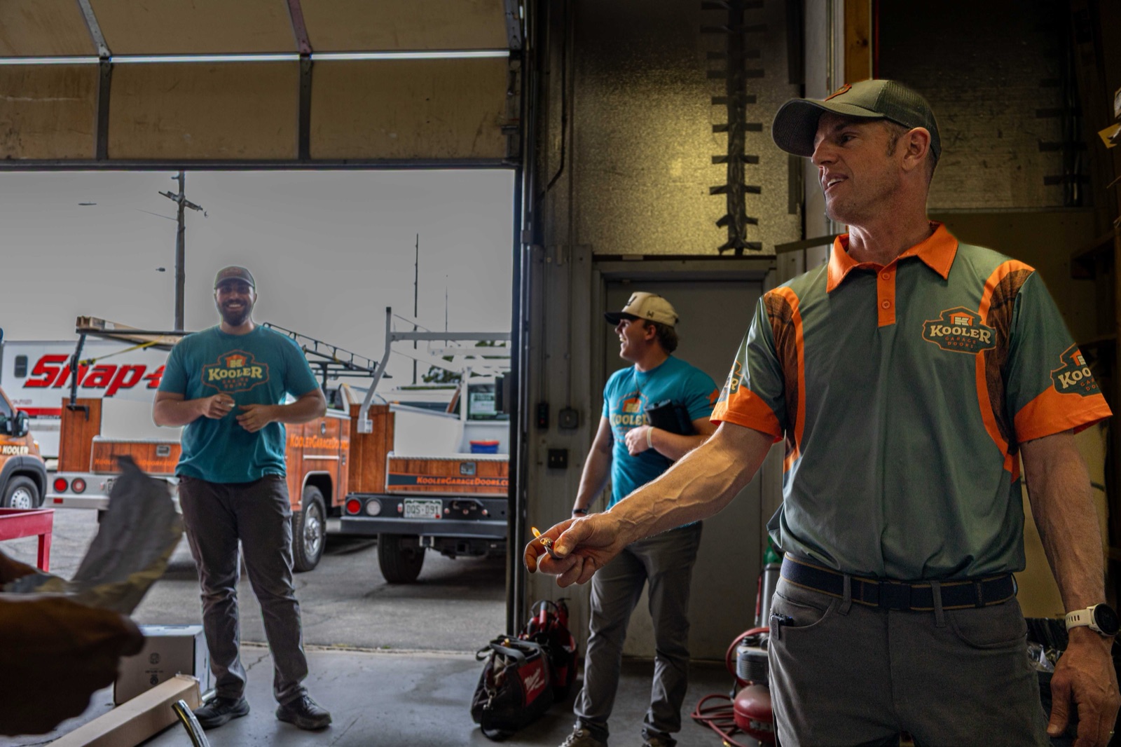 The Kooler Garage Doors crew gathered in the shop at the start of the day
