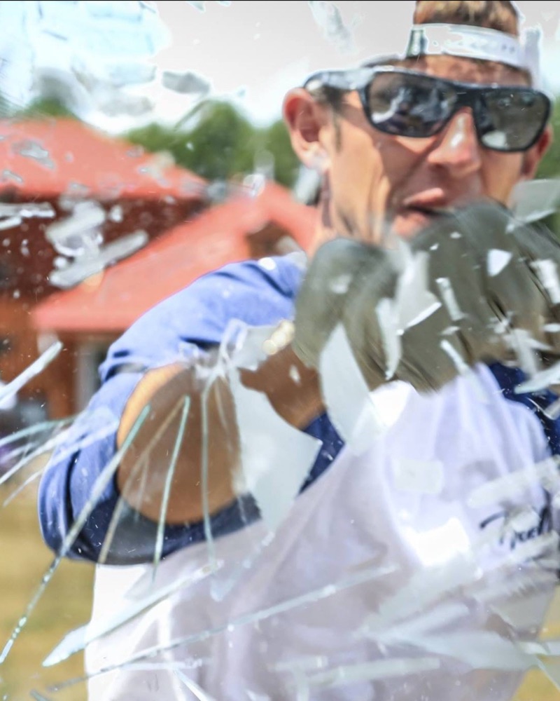 Matt Kuehlhorn, founder of Kooler Garage Doors, in the glass-breaking Kraftsman initiation ceremony